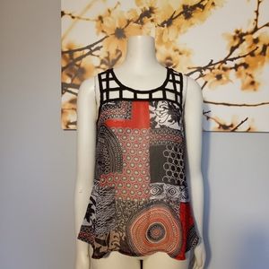 Sheer red and black sleeveless blouse